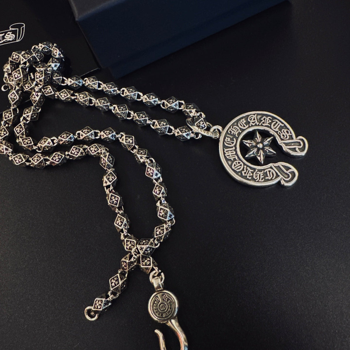 Martin Graham pendant necklace in polished metal-tone – detail view