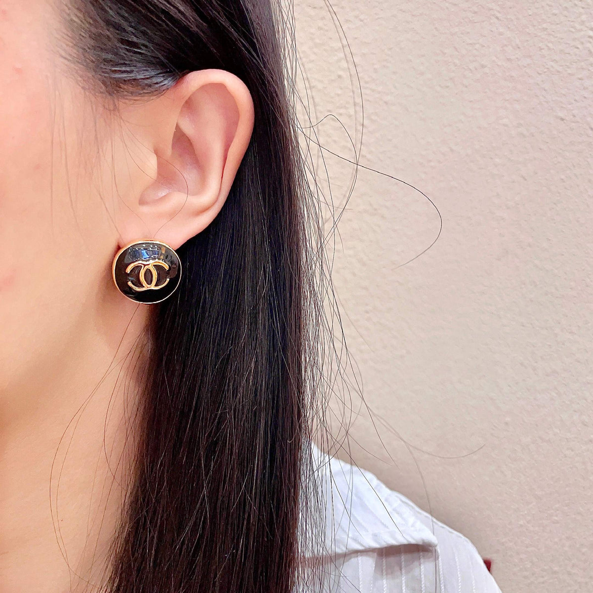 Martin Graham stud earrings in polished metal-tone – detail view