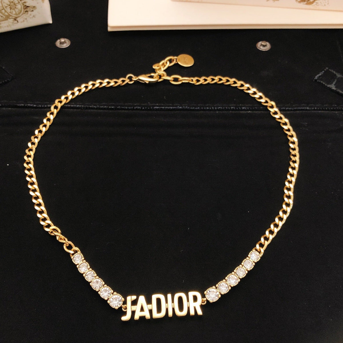 Martin Graham pendant necklace in polished metal-tone – detail view