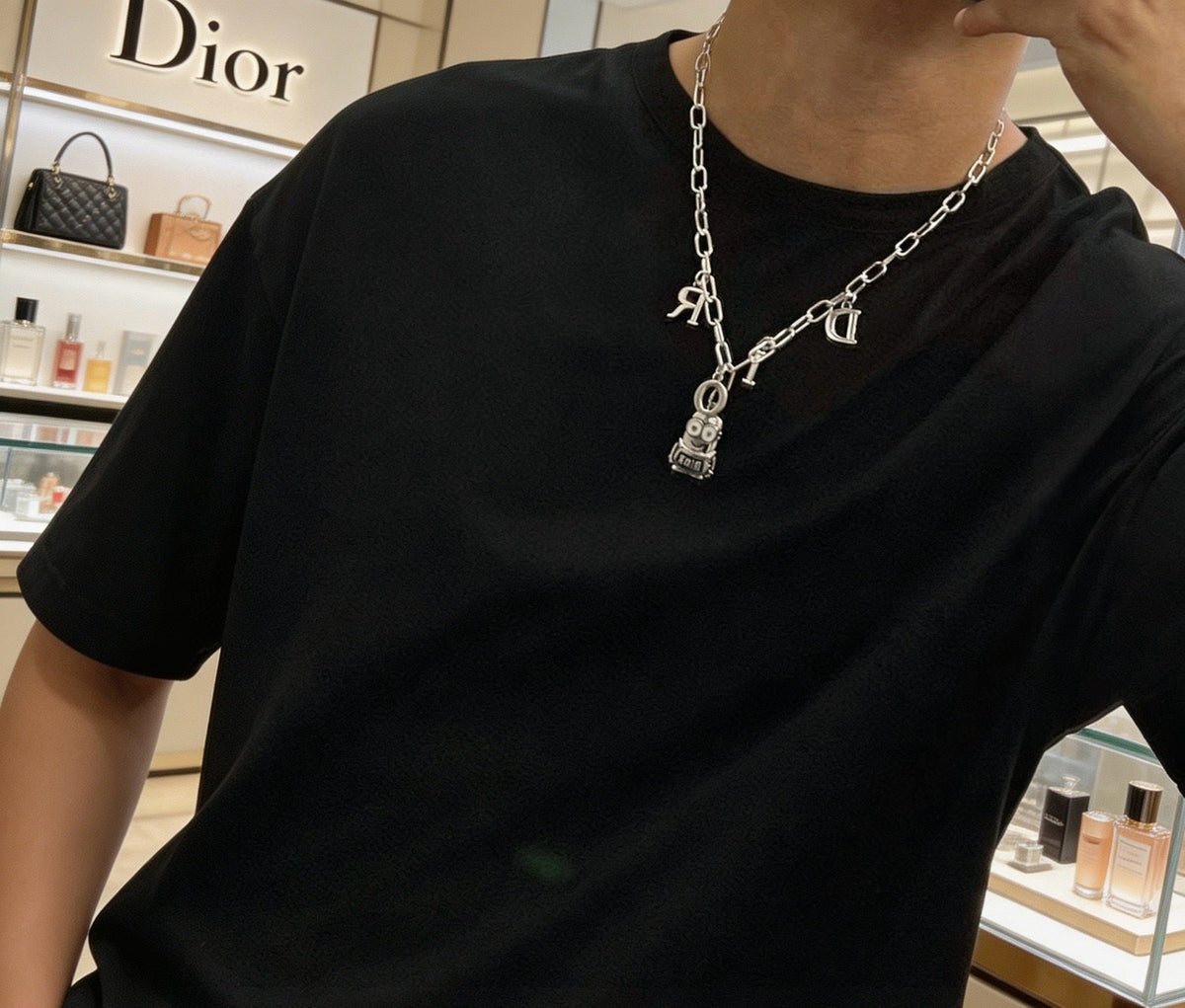 Martin Graham pendant necklace in polished metal-tone – detail view