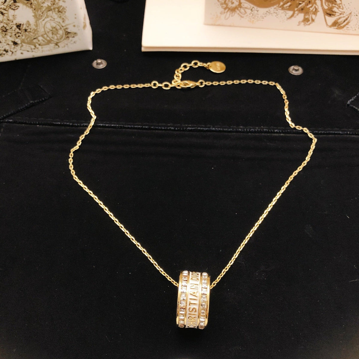 Martin Graham pendant necklace in polished metal-tone – detail view