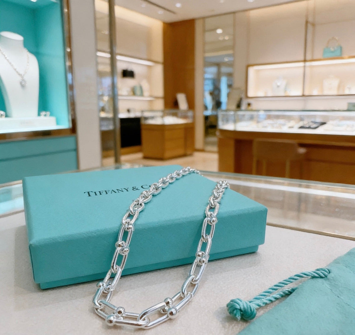 Martin Graham pendant necklace in polished metal-tone – detail view