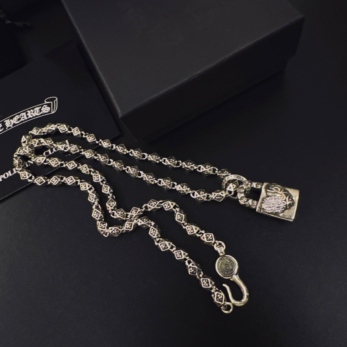 Martin Graham pendant necklace in polished metal-tone – detail view