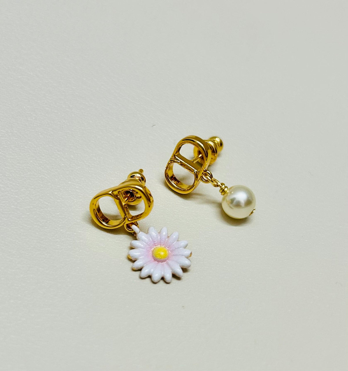 Martin Graham earrings in polished metal-tone – detail view