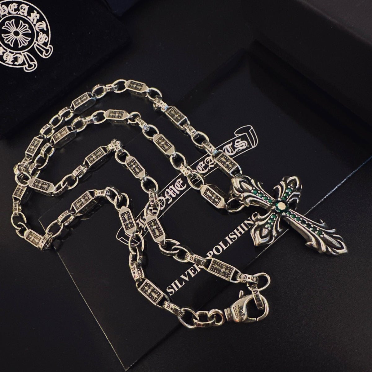 Martin Graham pendant necklace in polished metal-tone – detail view