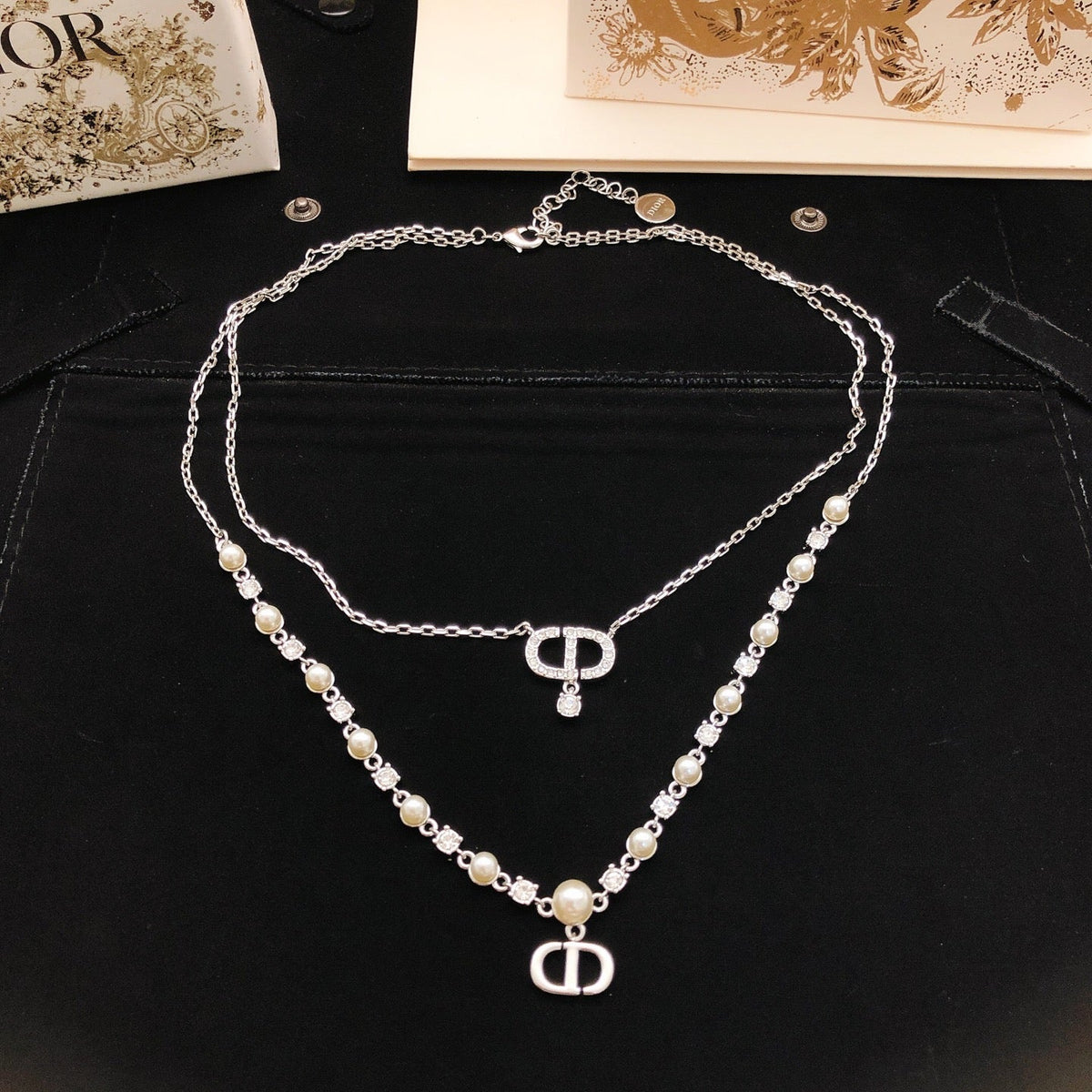 Martin Graham pendant necklace in polished metal-tone – detail view