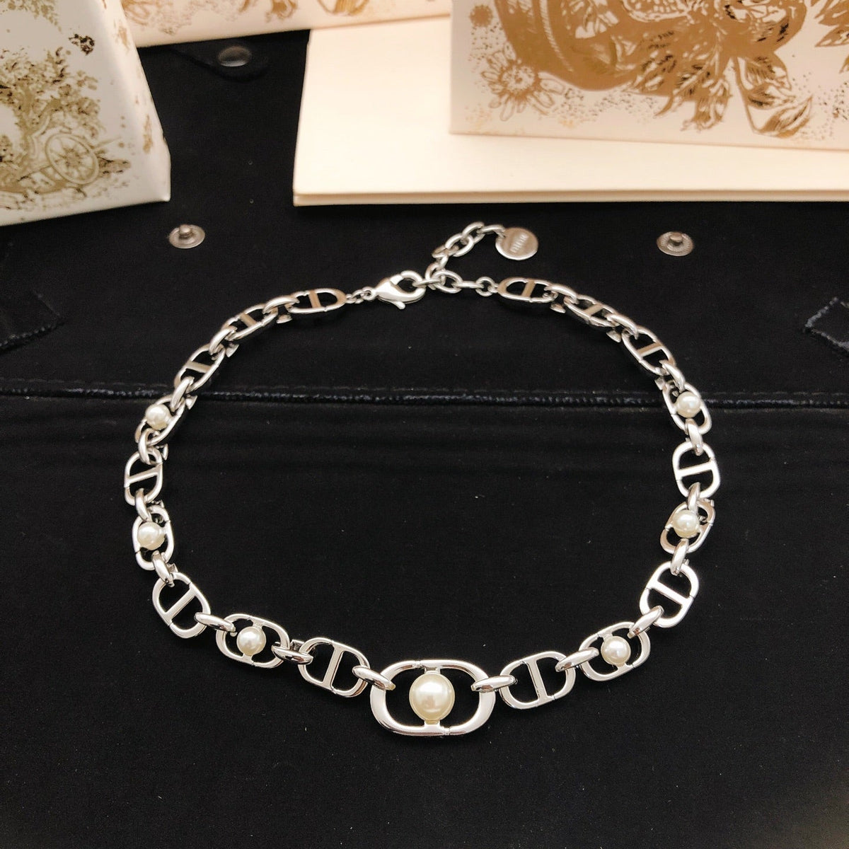 Martin Graham pendant necklace in polished metal-tone – detail view