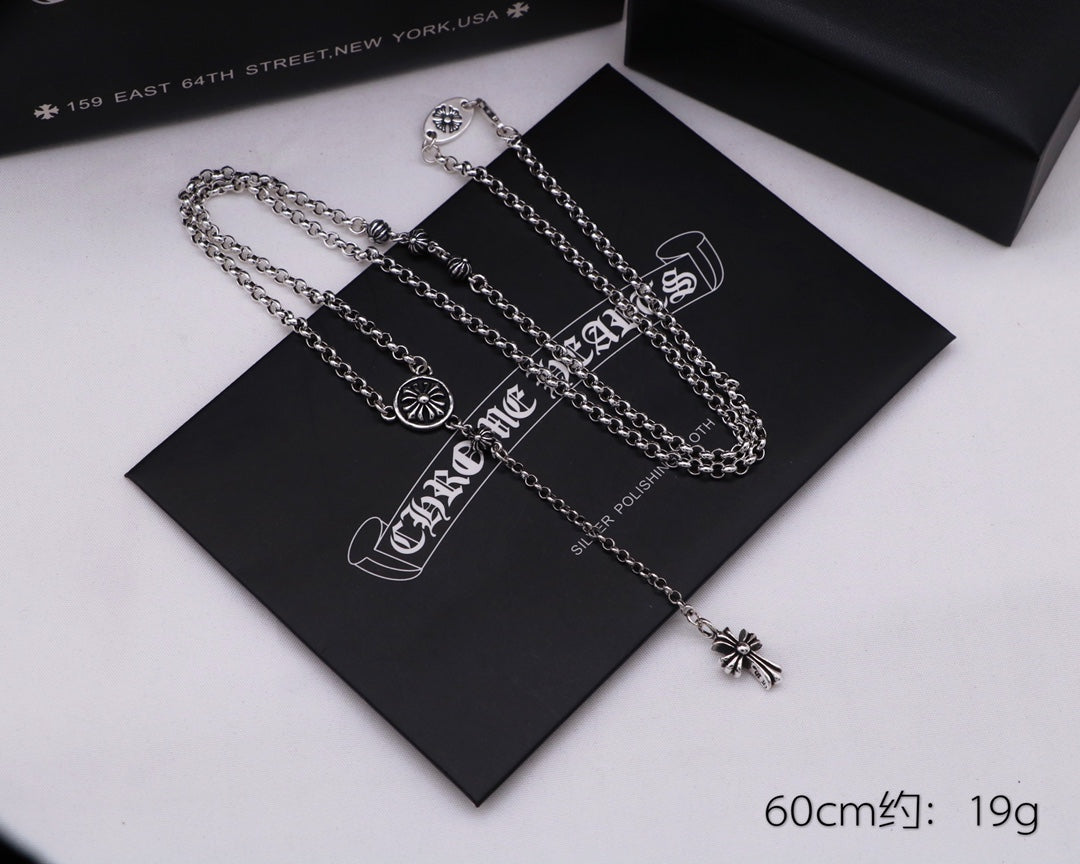 Martin Graham pendant necklace in polished metal-tone – detail view