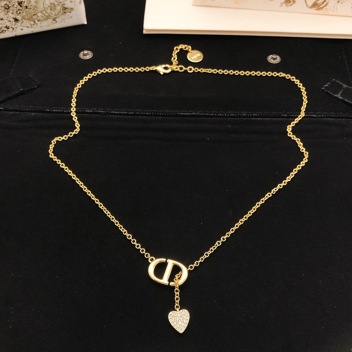 Martin Graham pendant necklace in polished metal-tone – detail view