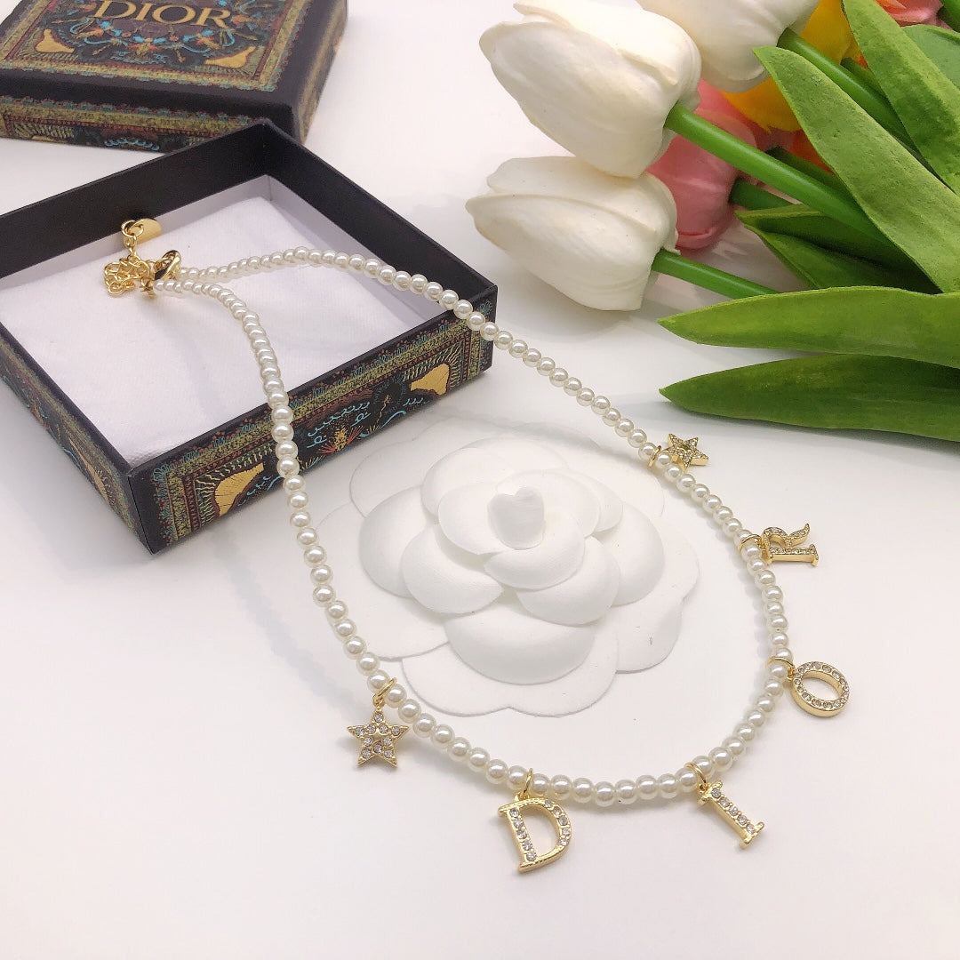Martin Graham pendant necklace in polished metal-tone – detail view