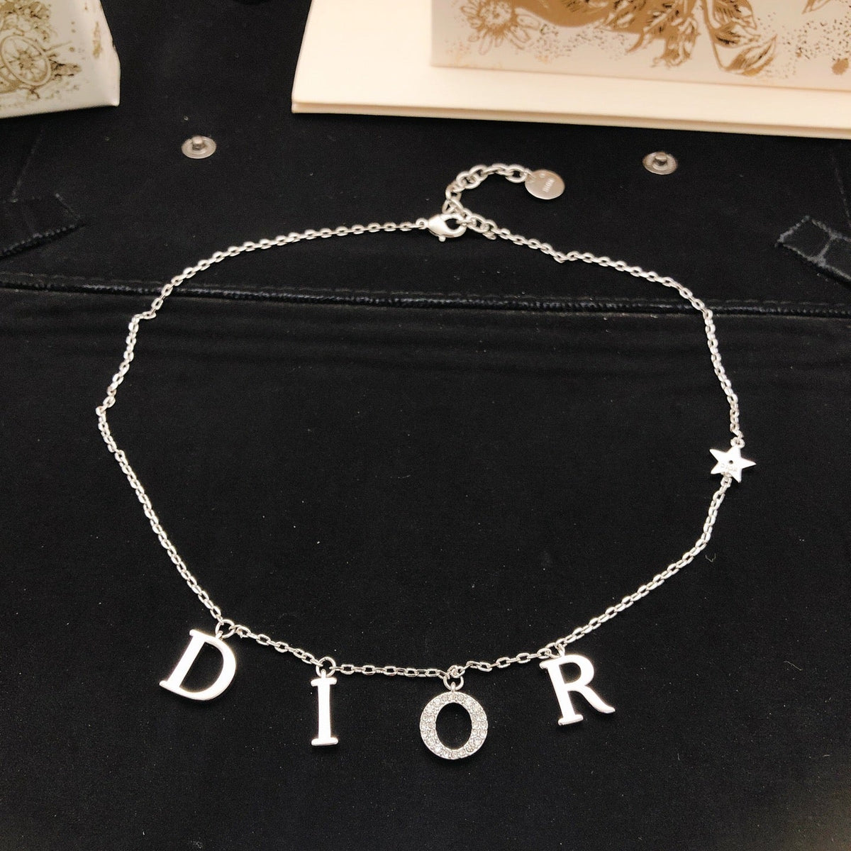 Martin Graham pendant necklace in polished metal-tone – detail view