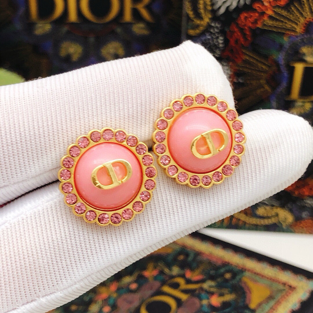 Martin Graham stud earrings in polished metal-tone – detail view