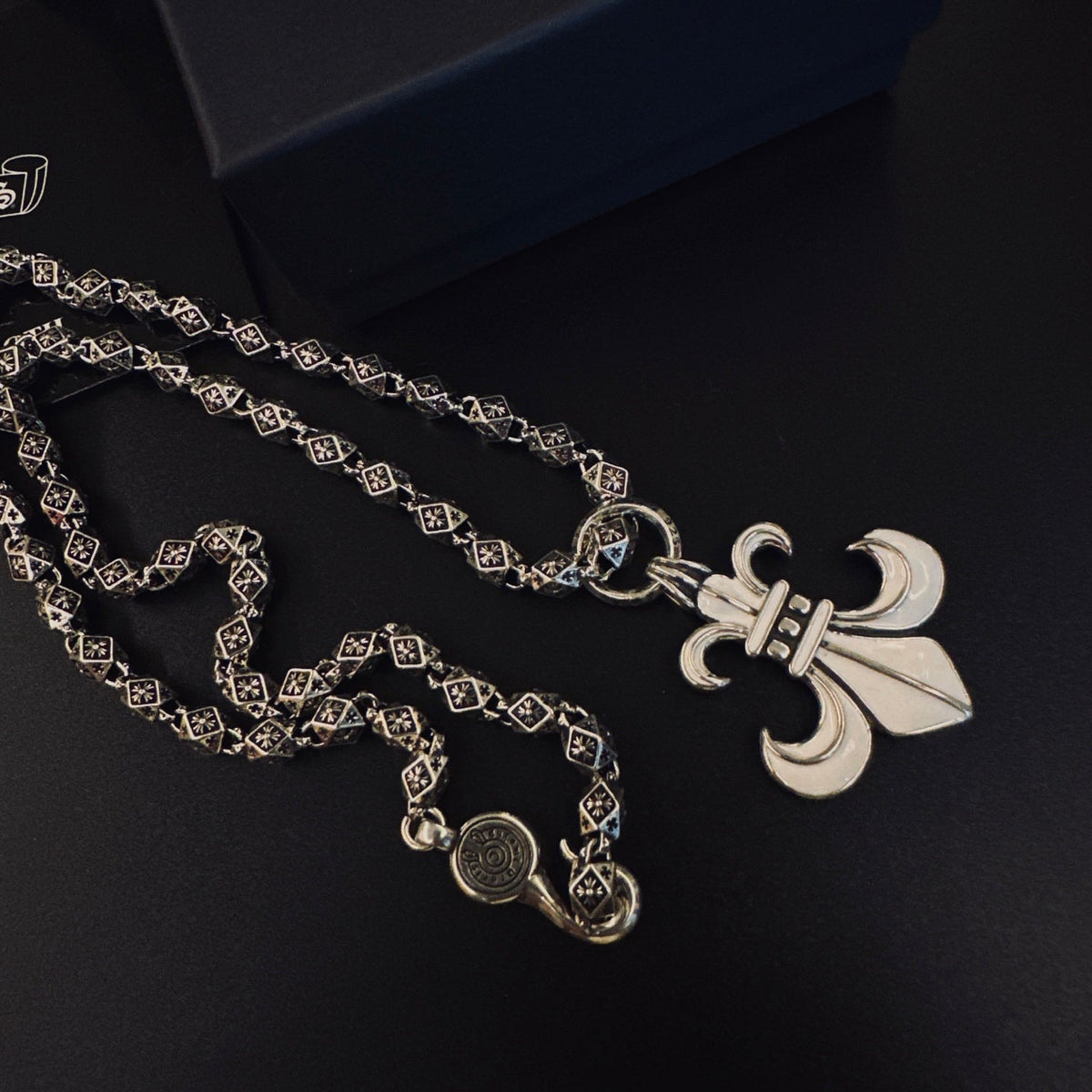 Martin Graham pendant necklace in polished metal-tone – detail view