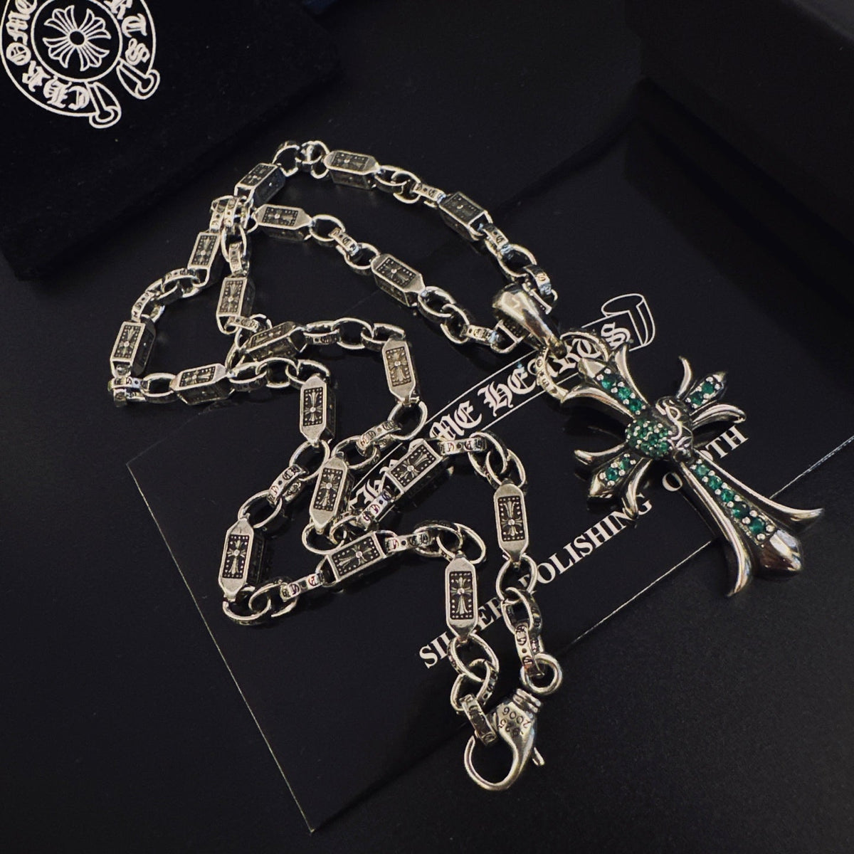 Martin Graham pendant necklace in polished metal-tone – detail view