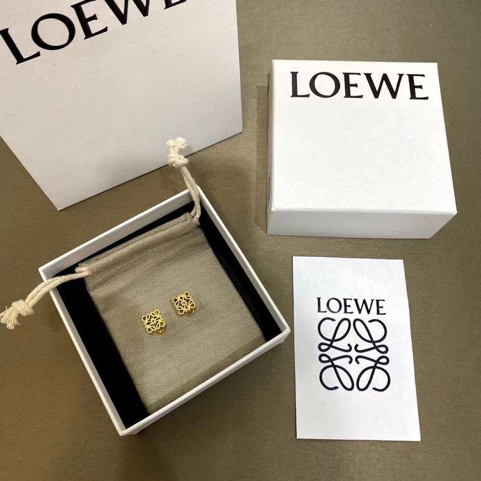 Martin Graham stud earrings in polished metal-tone – detail view