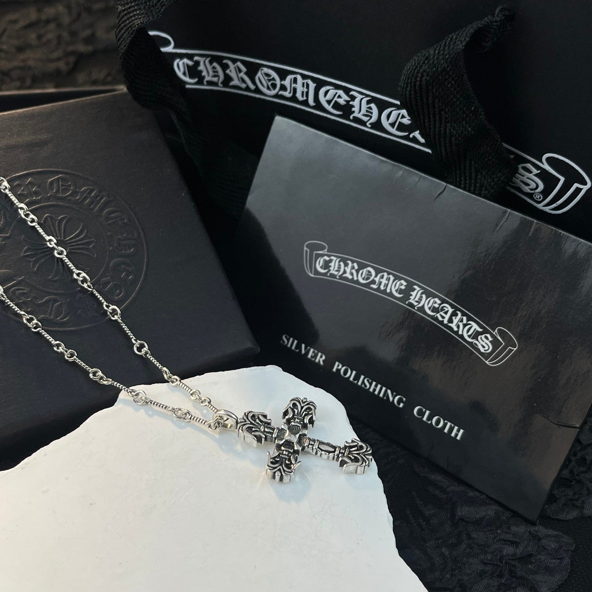 Martin Graham pendant necklace in polished metal-tone – detail view