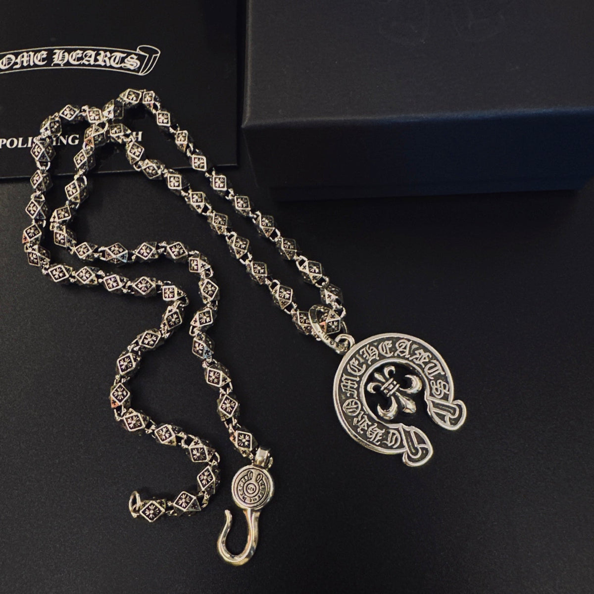 Martin Graham pendant necklace in polished metal-tone – detail view