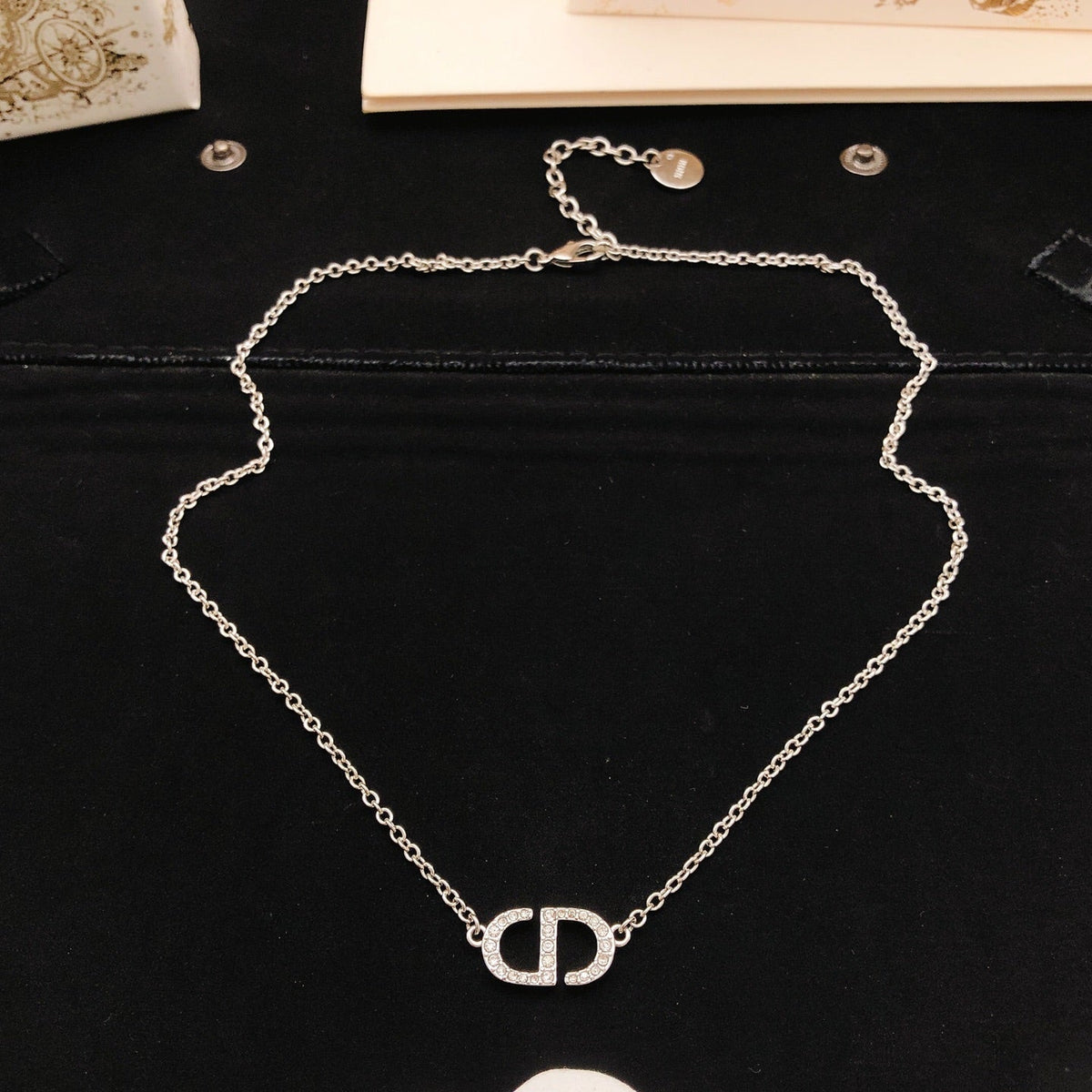 Martin Graham pendant necklace in polished metal-tone – detail view