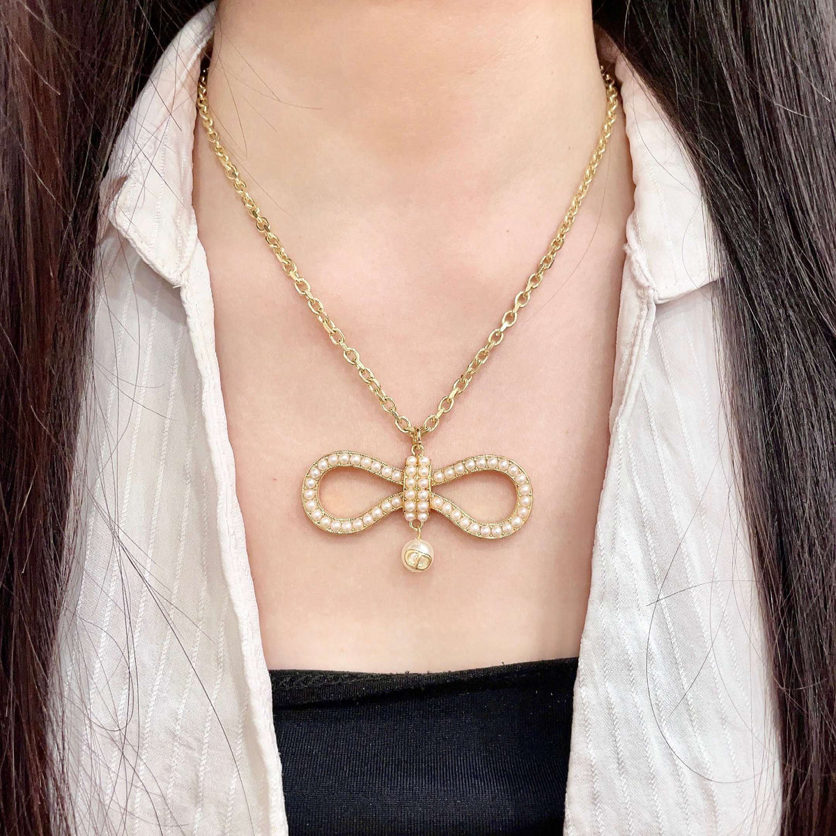 Martin Graham pendant necklace in polished metal-tone – detail view