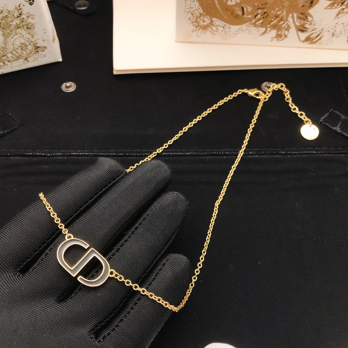 Martin Graham pendant necklace in polished metal-tone – detail view
