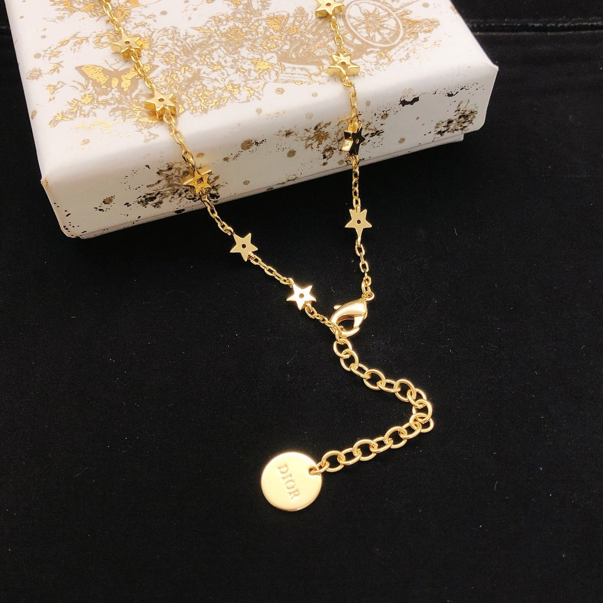Martin Graham pendant necklace in polished metal-tone – detail view
