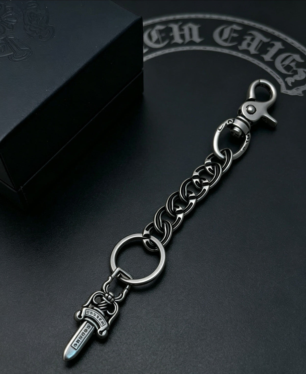 Martin Graham chain accessory in polished metal-tone – detail view