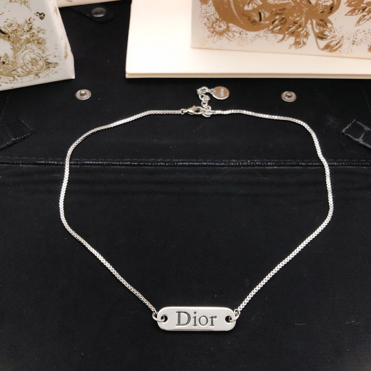 Martin Graham pendant necklace in polished metal-tone – detail view