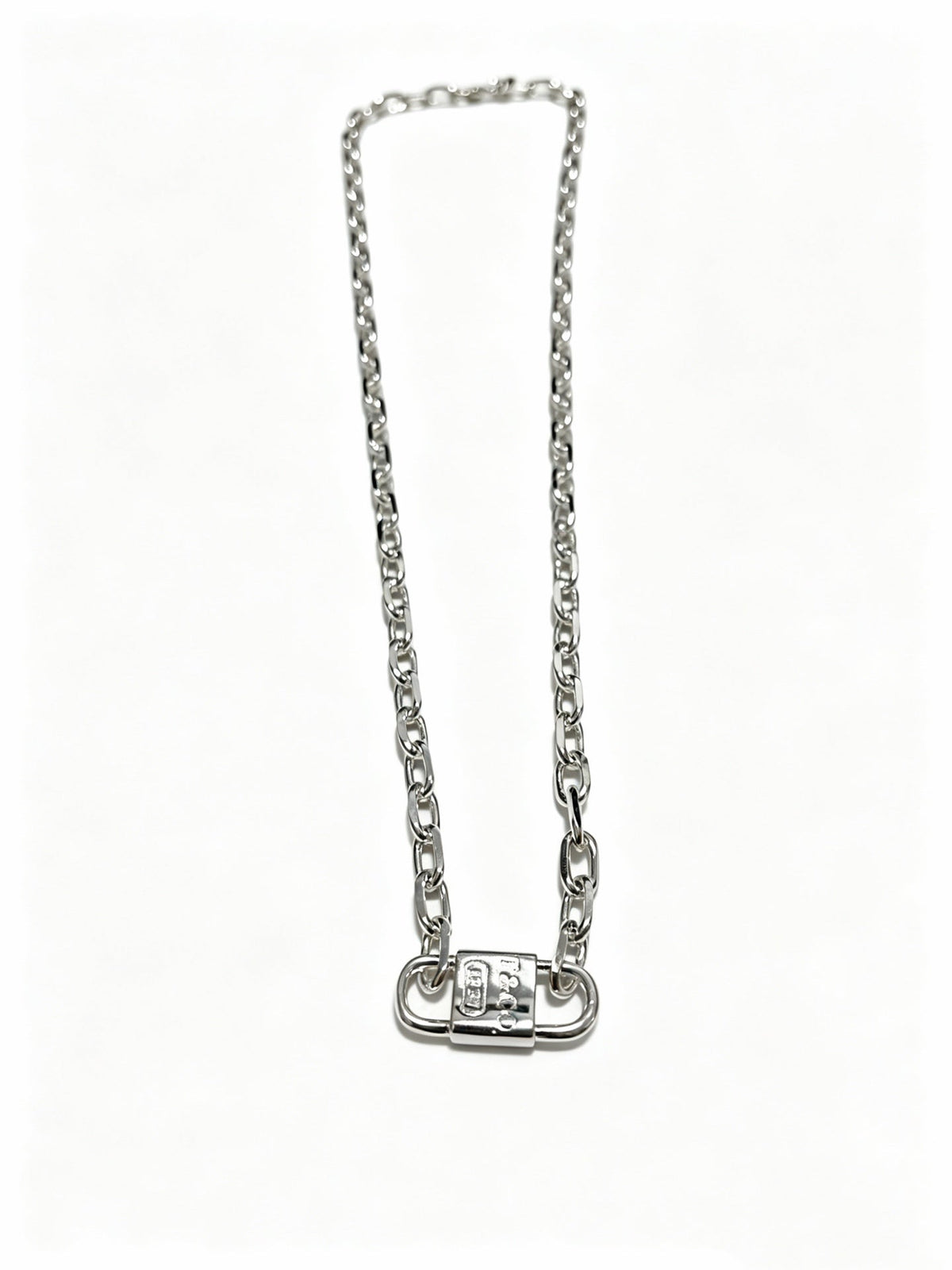 Martin Graham pendant necklace in polished metal-tone – detail view