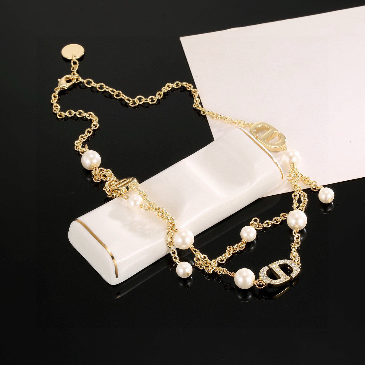 Martin Graham pendant necklace in polished metal-tone – detail view