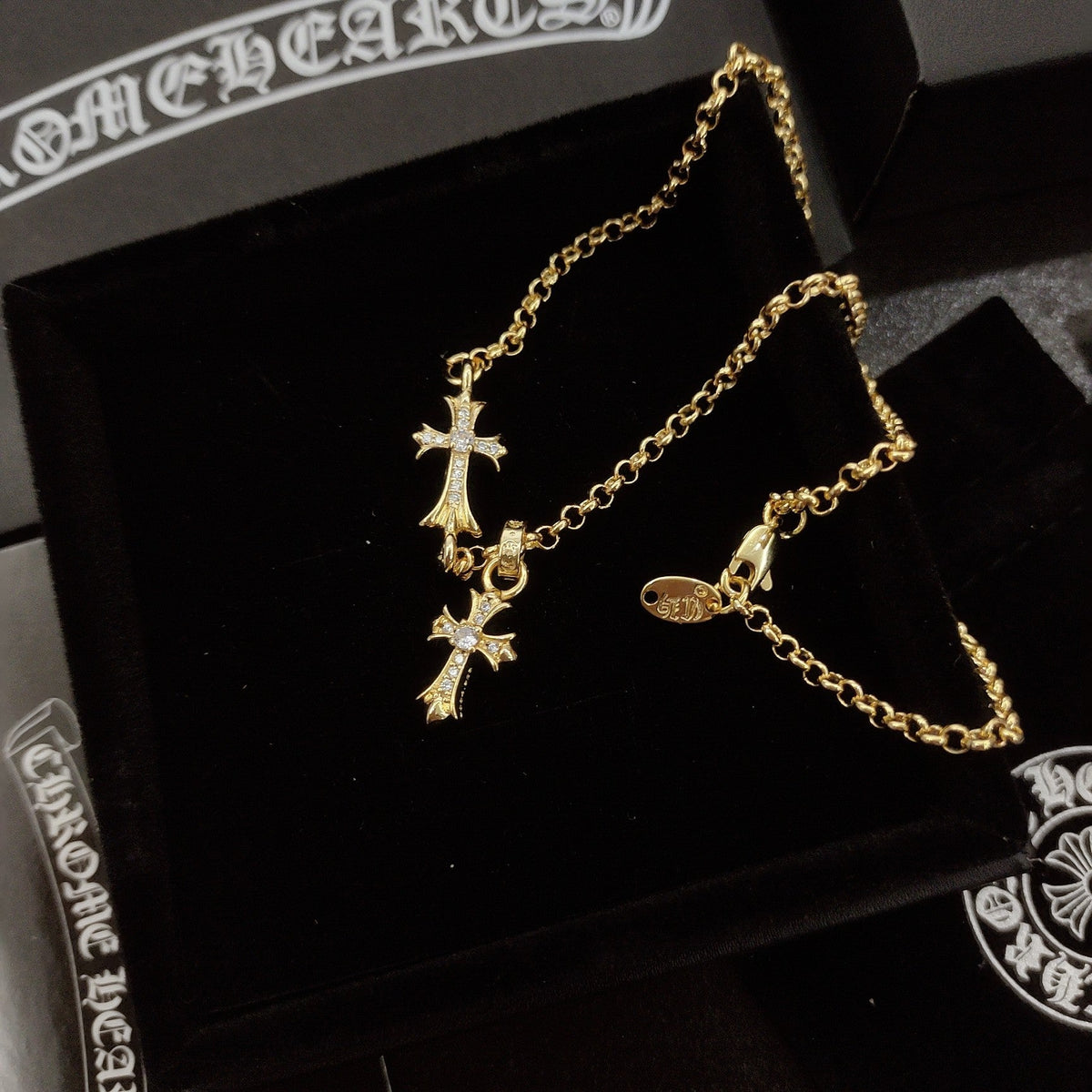 Martin Graham pendant necklace in polished metal-tone – detail view