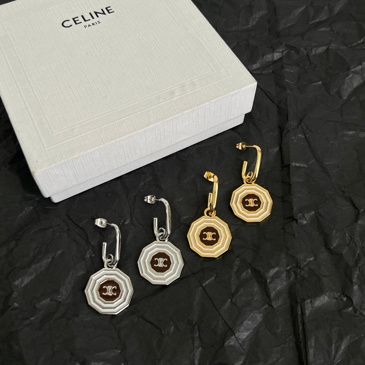 Martin Graham stud earrings in polished metal-tone – detail view