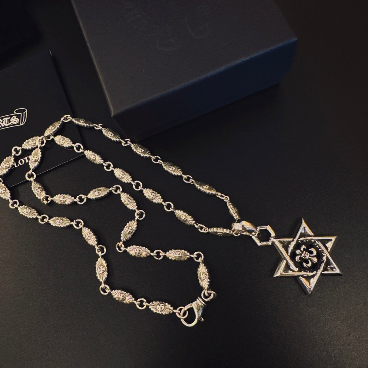 Martin Graham pendant necklace in polished metal-tone – detail view