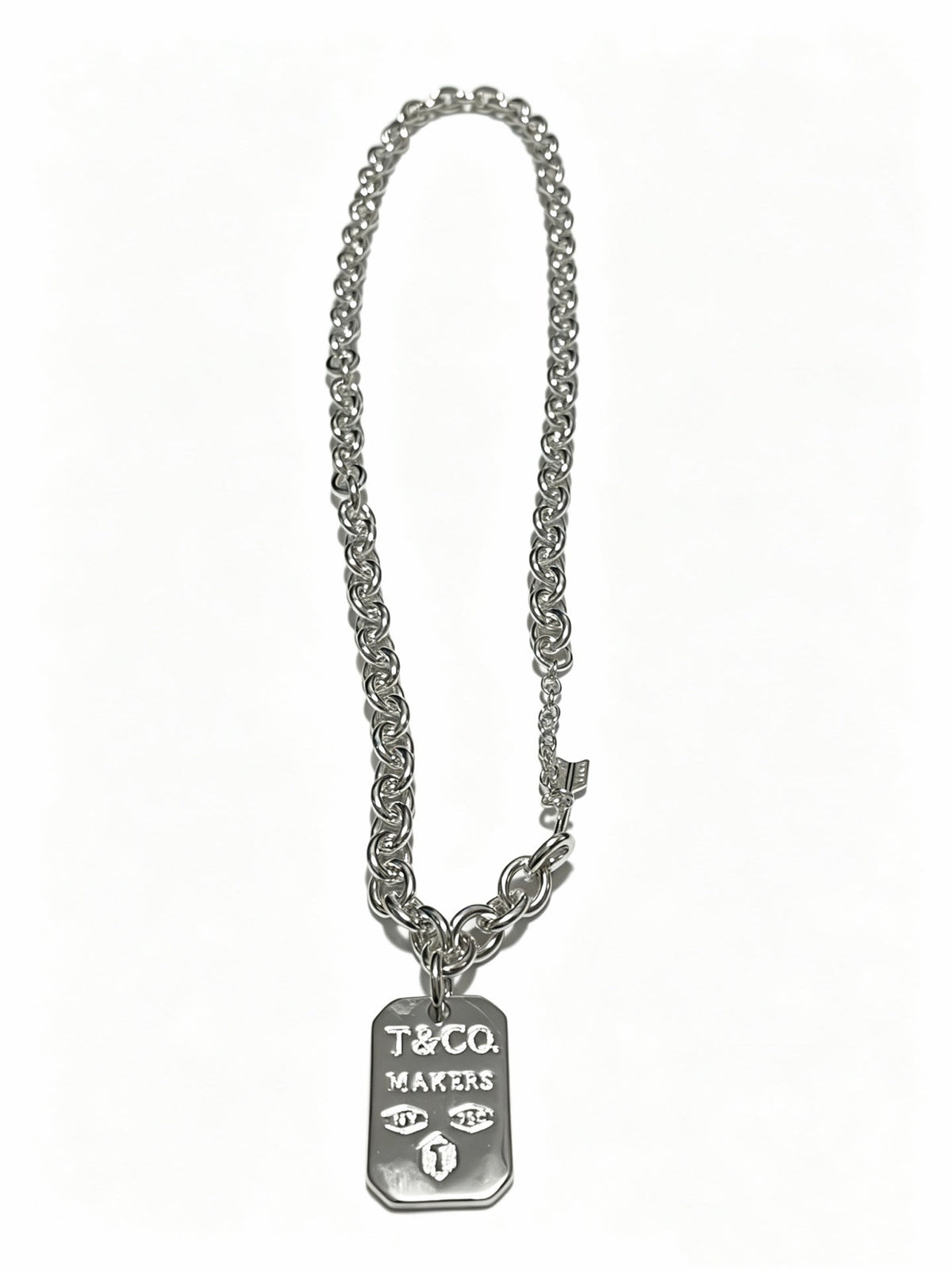 Martin Graham pendant necklace in polished metal-tone – detail view
