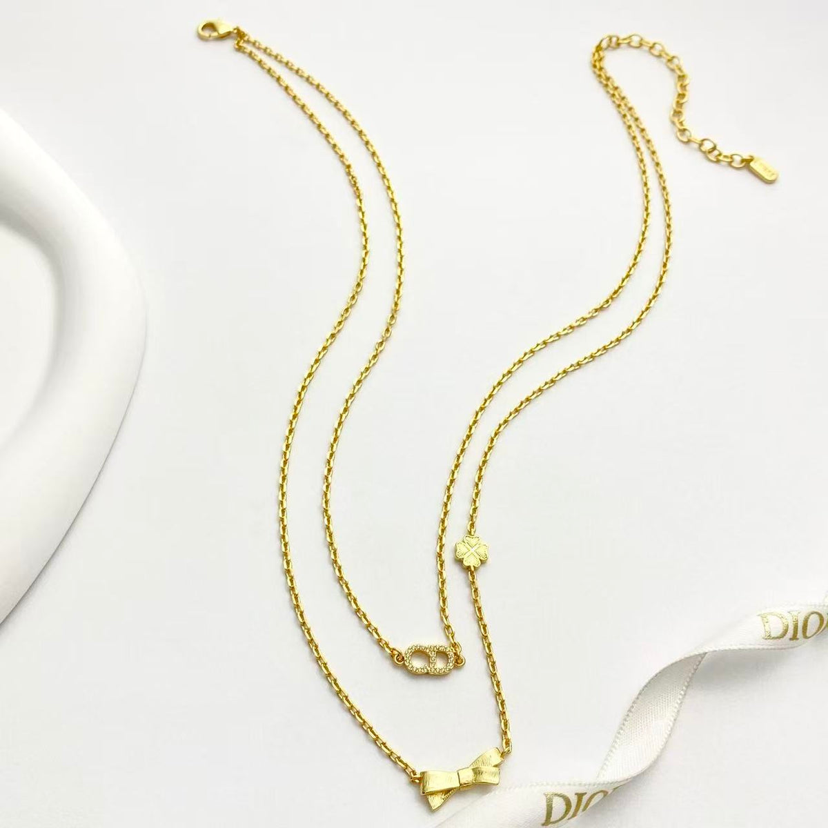 Martin Graham pendant necklace in polished metal-tone – detail view