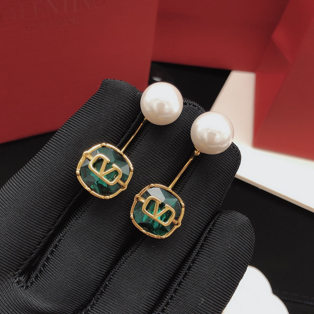 Martin Graham drop earrings in polished metal-tone – detail view