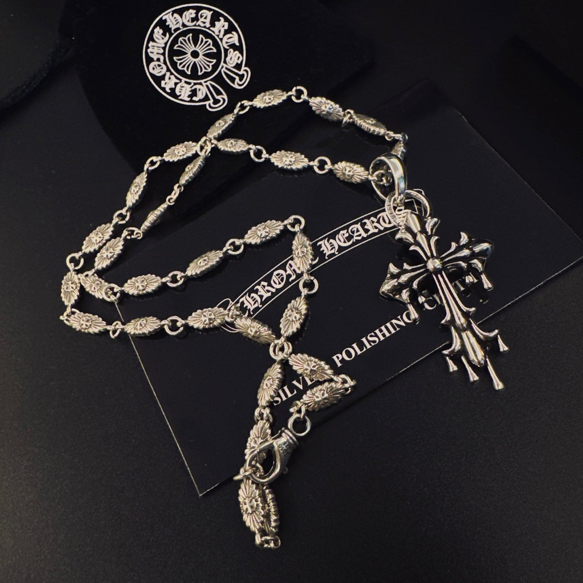 Martin Graham pendant necklace in polished metal-tone – detail view