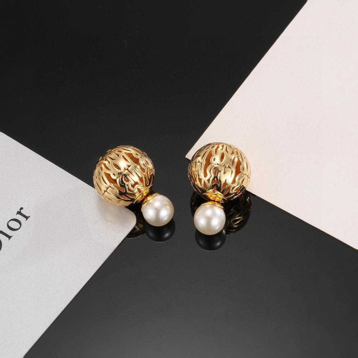 Martin Graham earrings in polished metal-tone – detail view