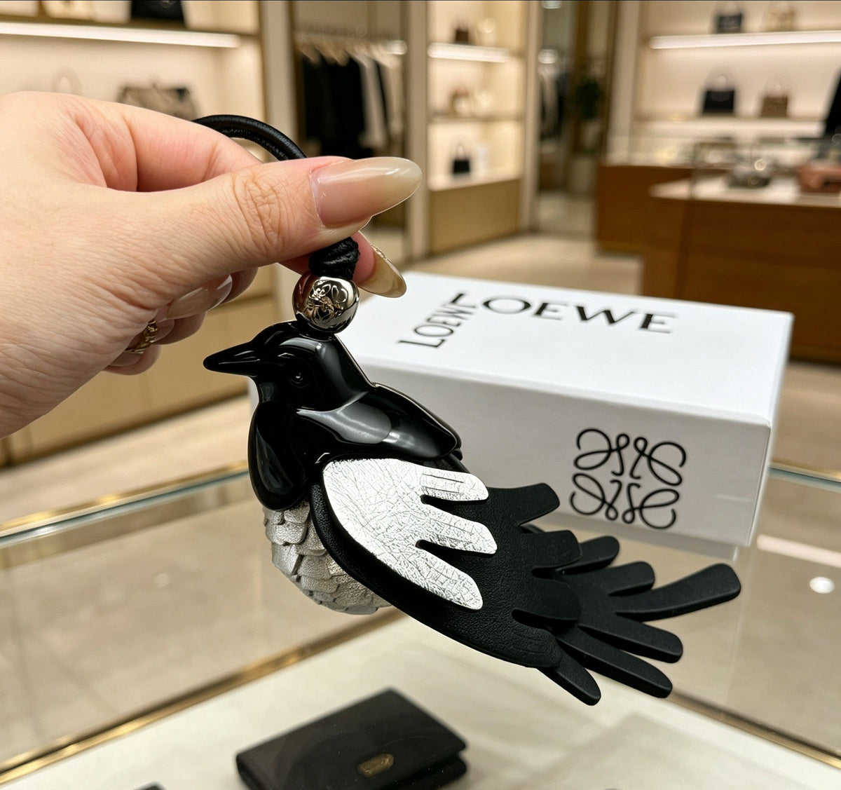 Martin Graham bag charm in polished metal-tone – detail view