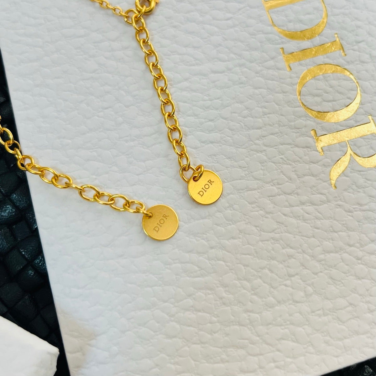 Martin Graham pendant necklace in polished metal-tone – detail view