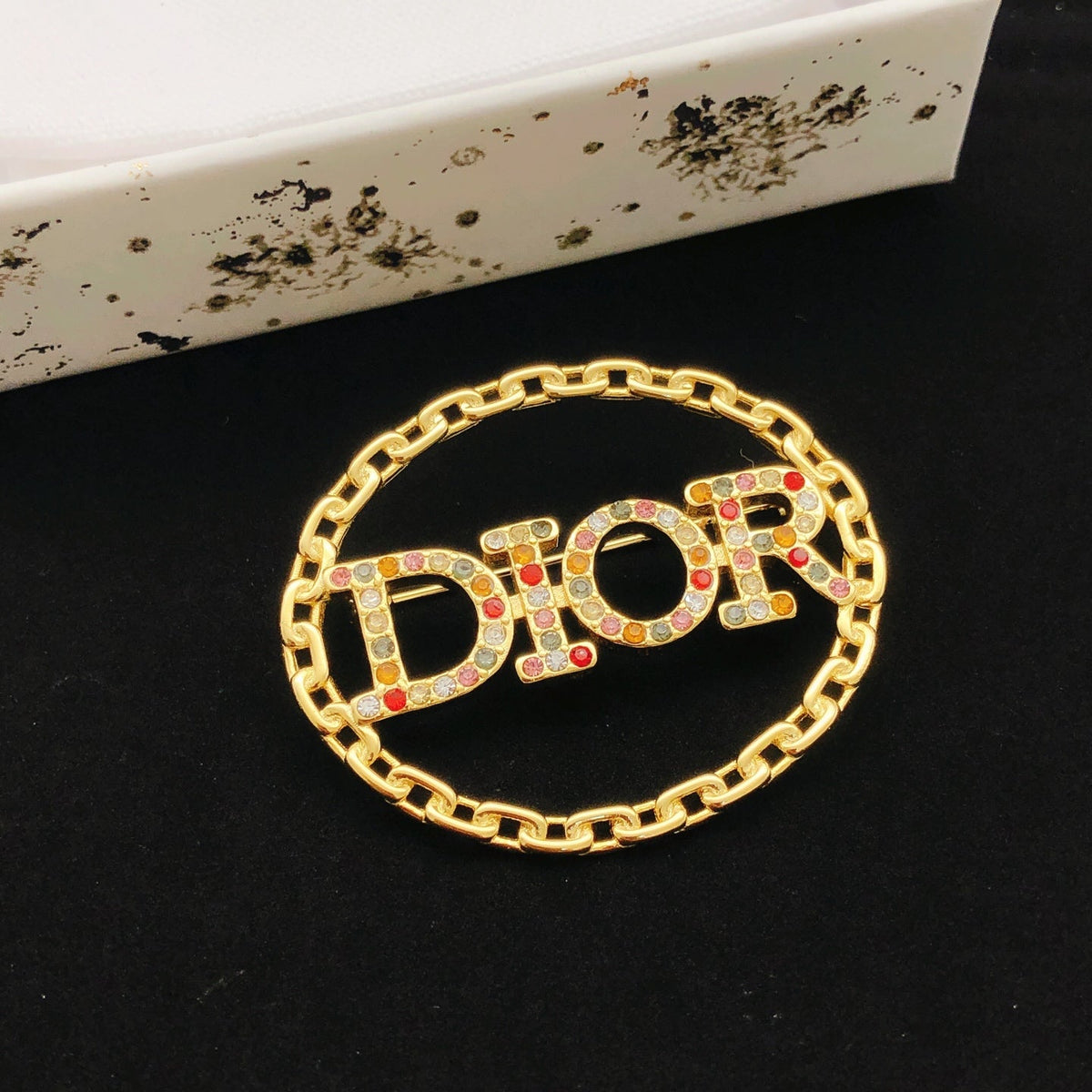 Martin Graham brooch in polished metal-tone – detail view