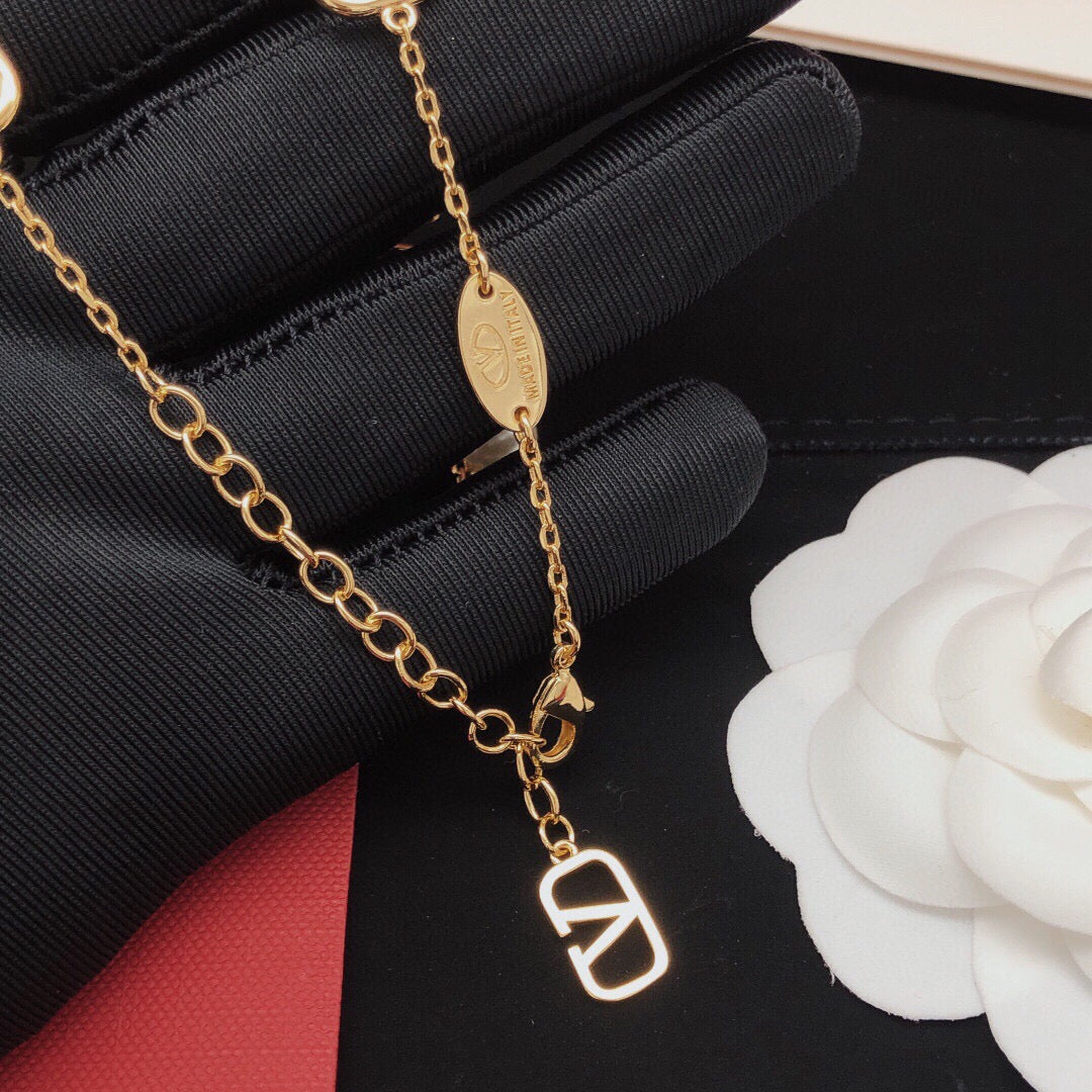 Martin Graham pendant necklace in polished metal-tone – detail view