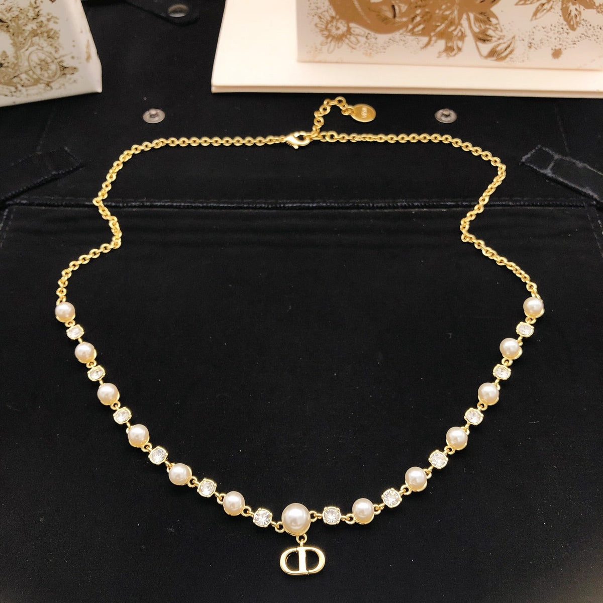 Martin Graham pendant necklace in polished metal-tone – detail view