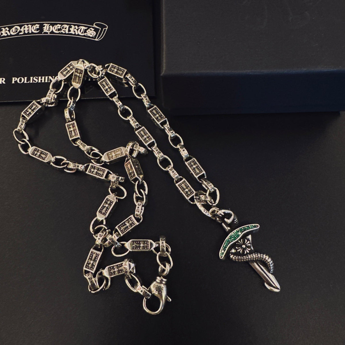 Martin Graham pendant necklace in polished metal-tone – detail view