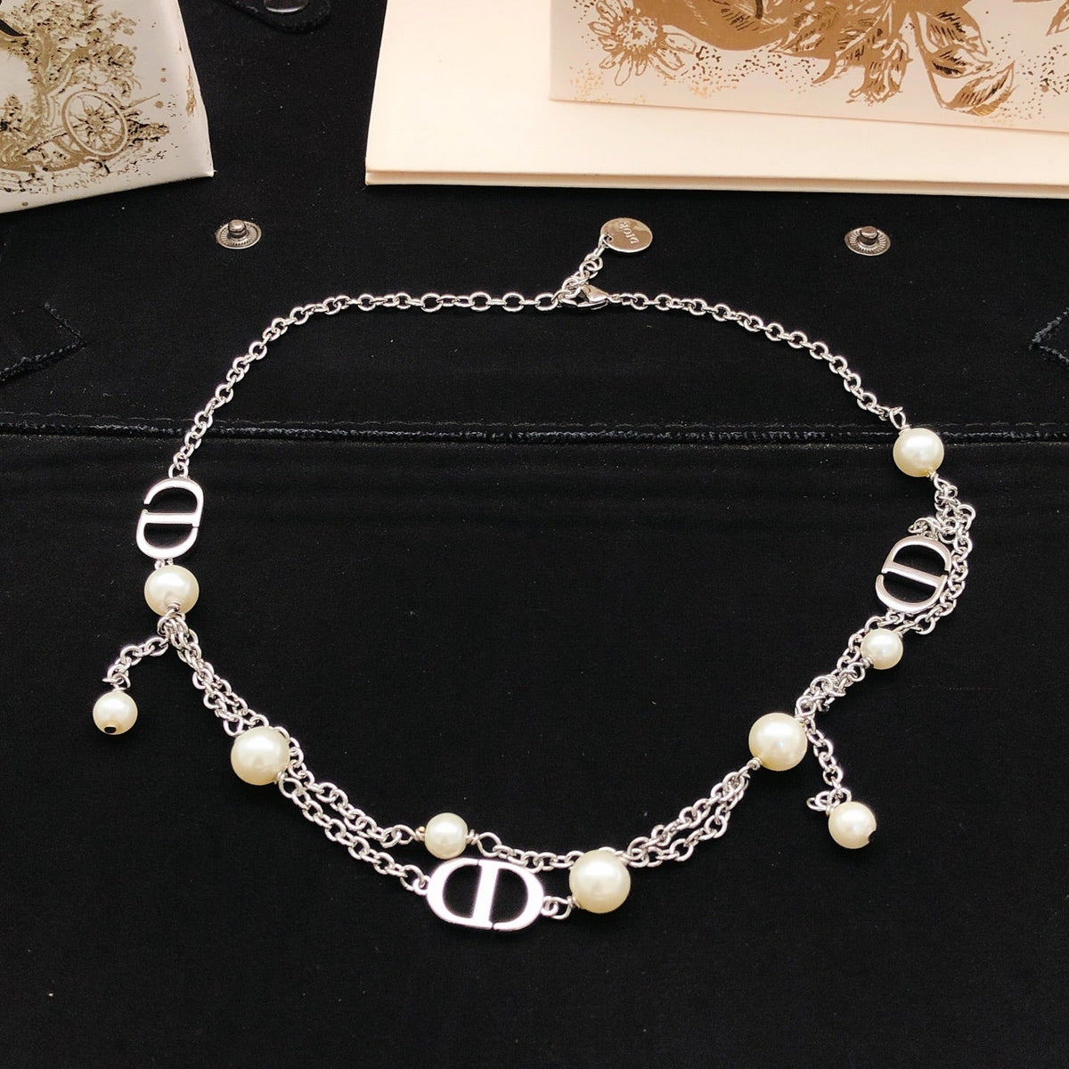 Martin Graham pendant necklace in polished metal-tone – detail view