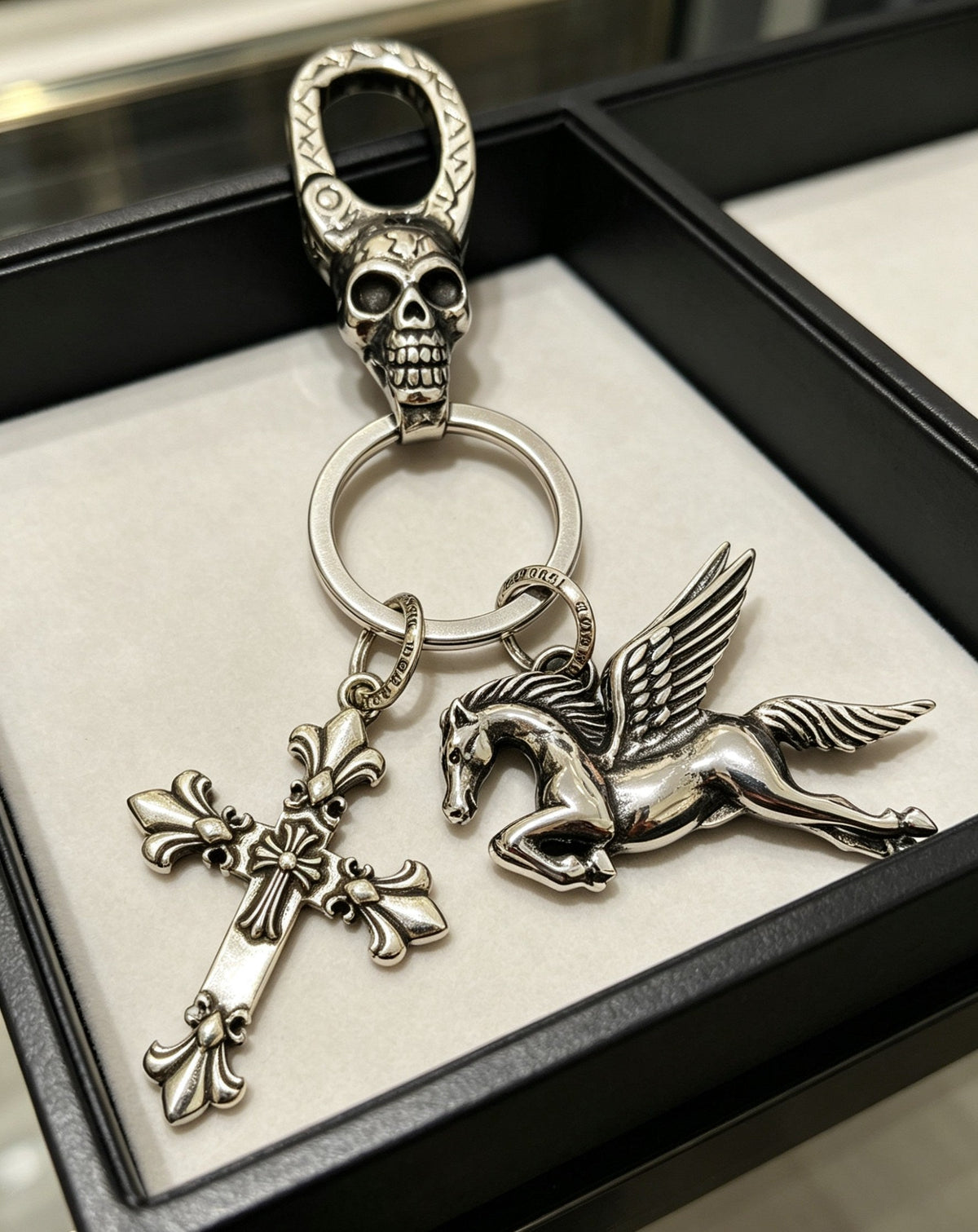 Martin Graham keychain in polished metal-tone – detail view