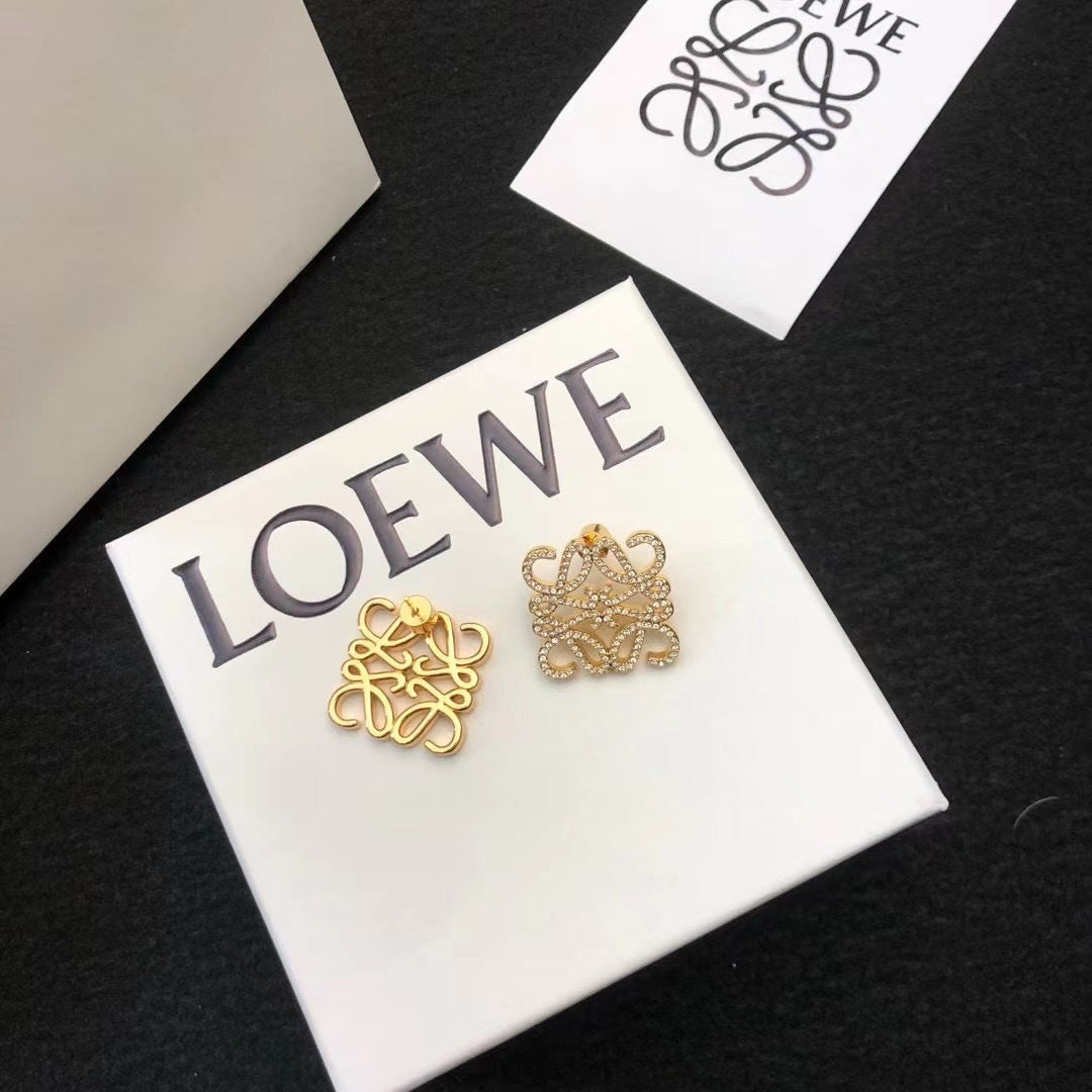 Martin Graham stud earrings in polished metal-tone – detail view