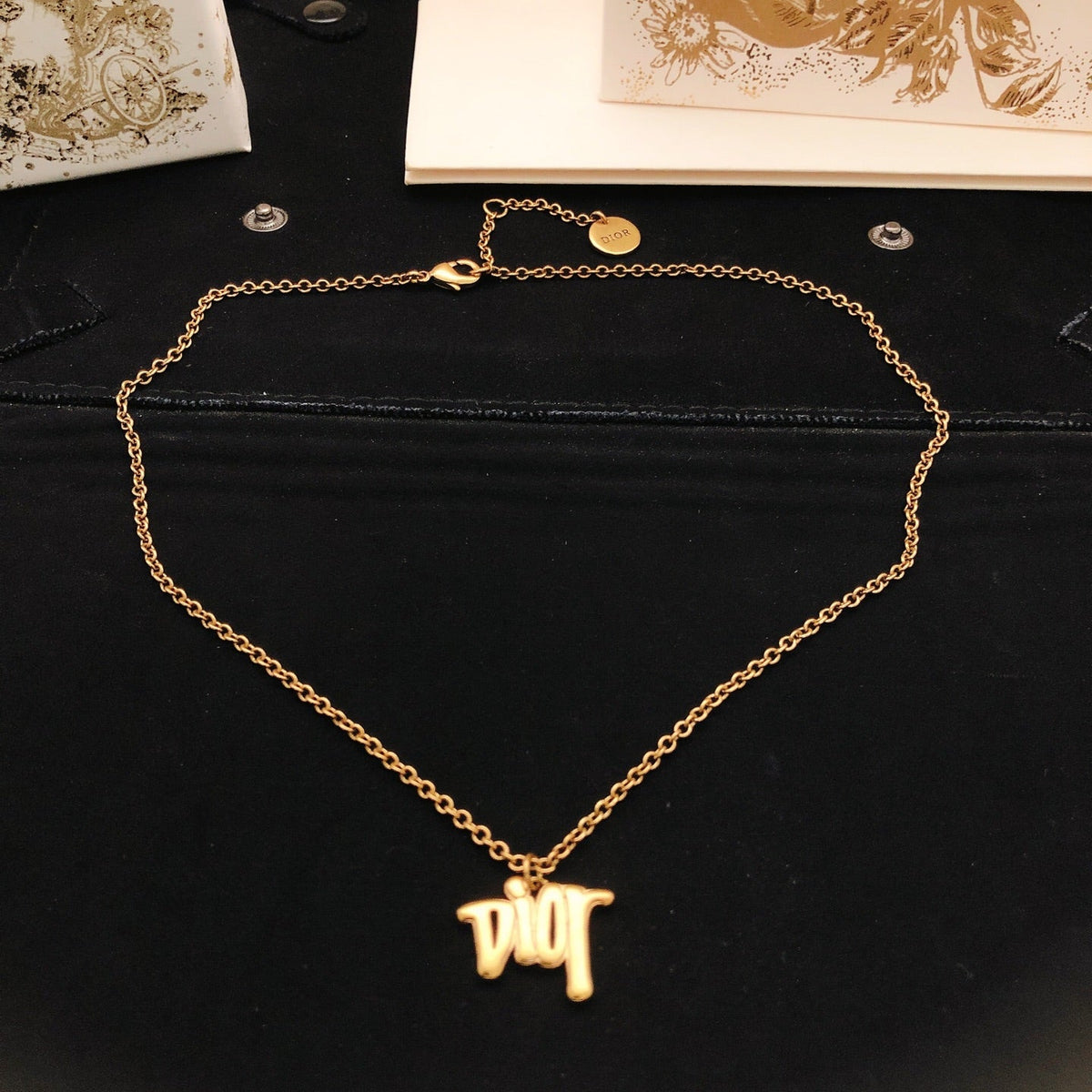 Martin Graham pendant necklace in polished metal-tone – detail view