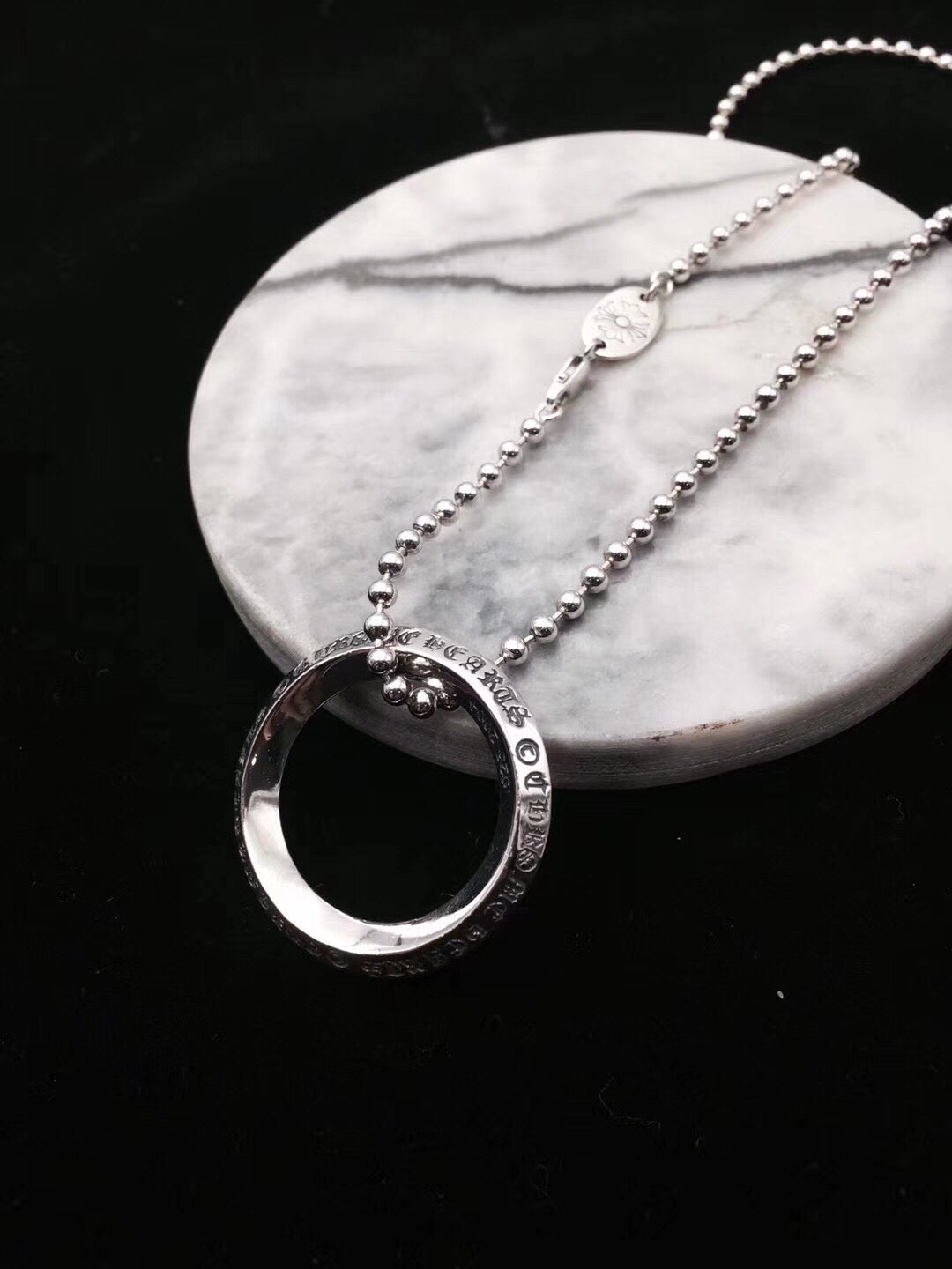 Martin Graham pendant in polished metal-tone – detail view