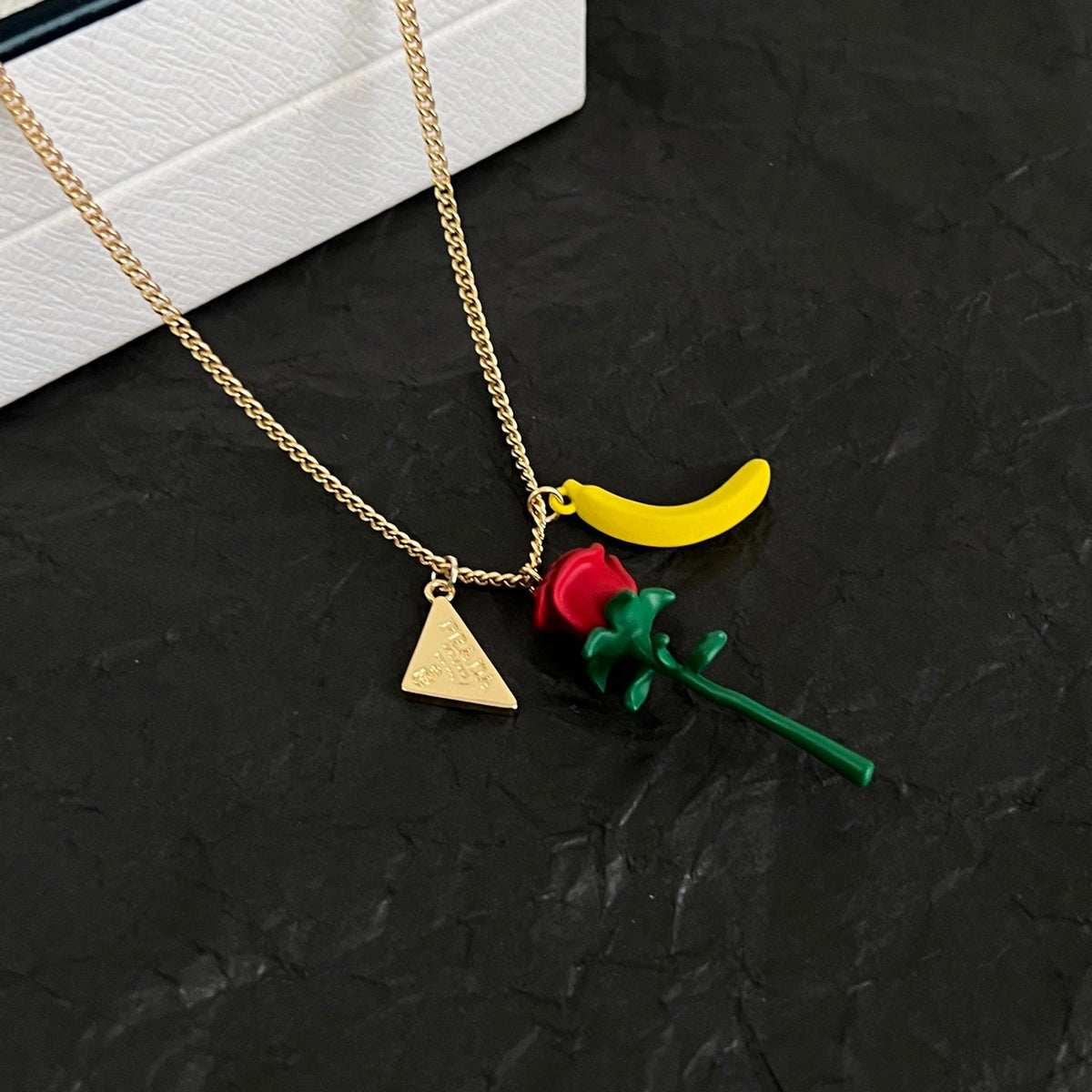 Martin Graham pendant necklace in polished metal-tone – detail view