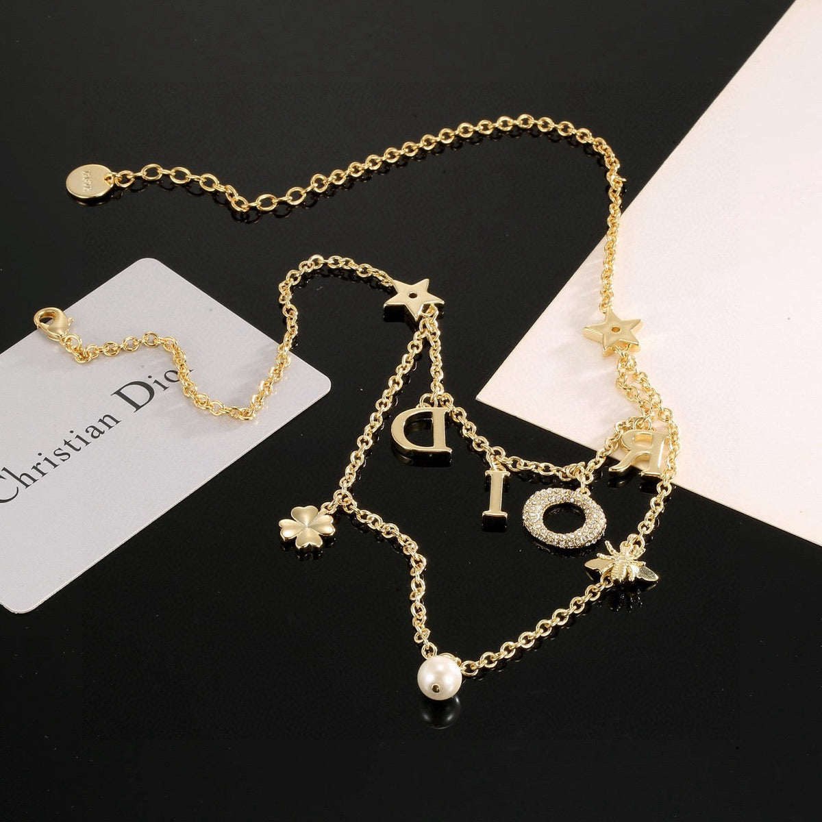 Martin Graham pendant necklace in polished metal-tone – detail view